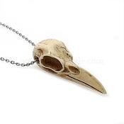 Simulated bird head pendant necklace